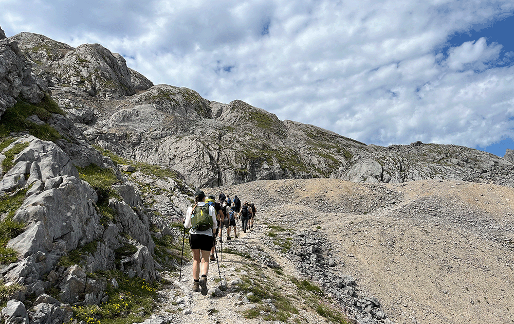 Hikers on a rocky mountain pass