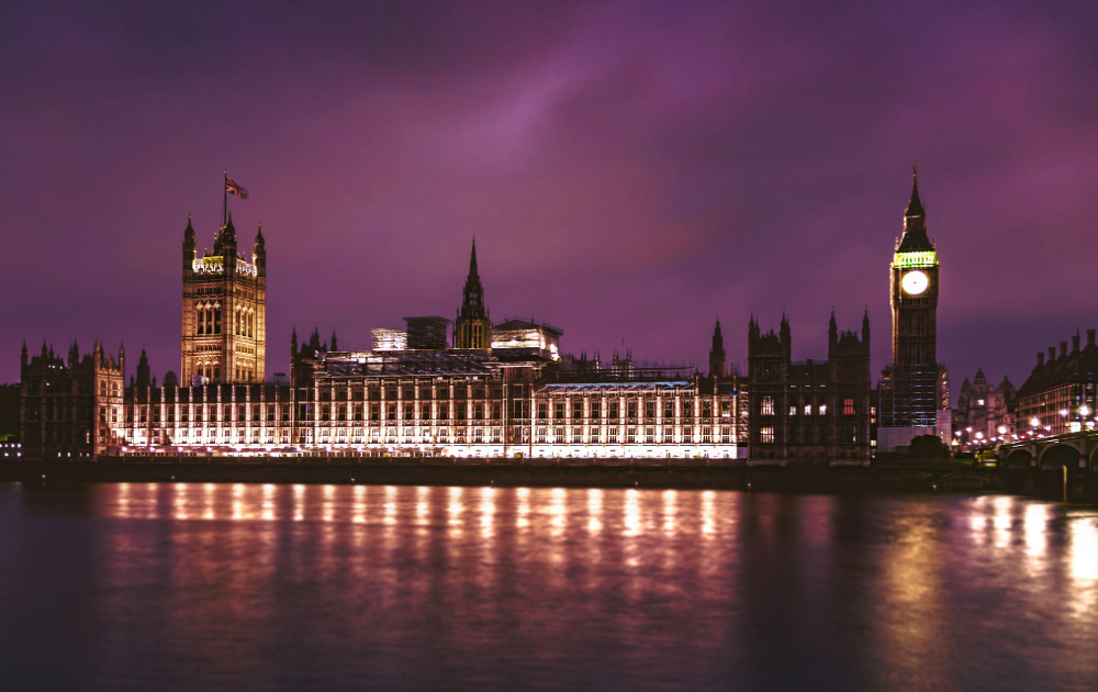 UK Parliament with a purple sky