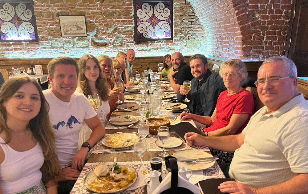 A group posing at a restaurant